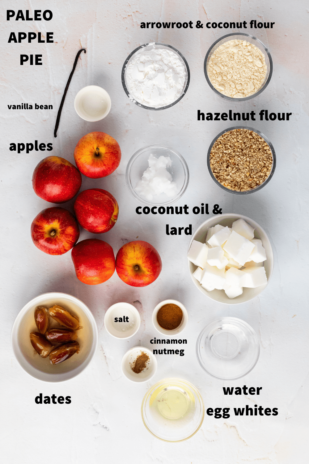 paleo apple pie ingredients measured out in little bowls. 