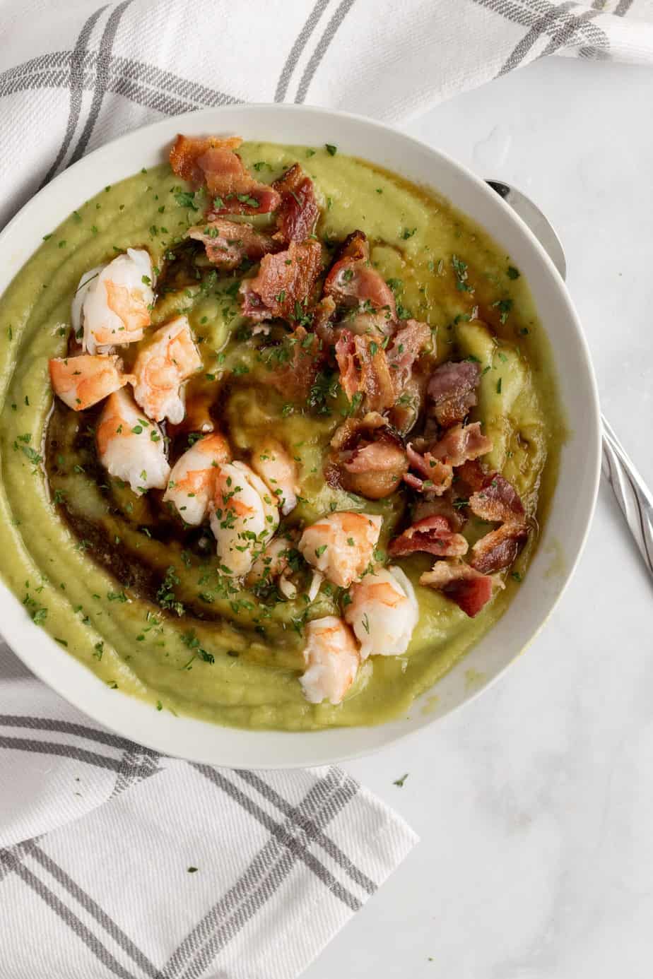 aip breakfast bowl- shrimp chunks and bacon bits over veggie puree