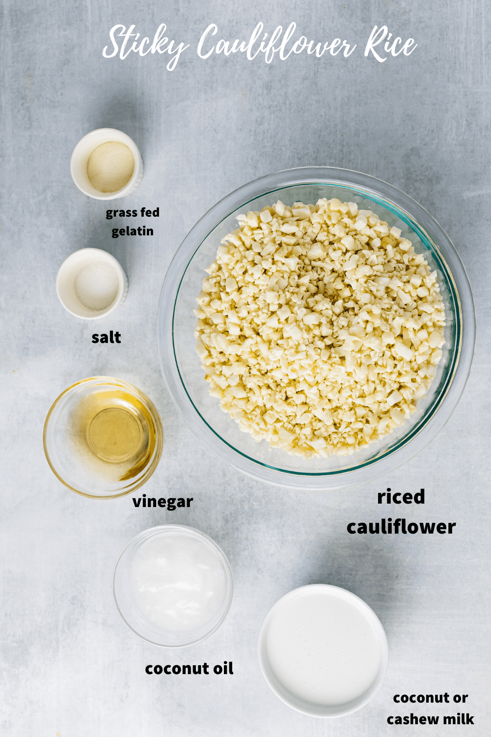 ingredients for sticky cauliflower rice measured out in bowls on a grey backround