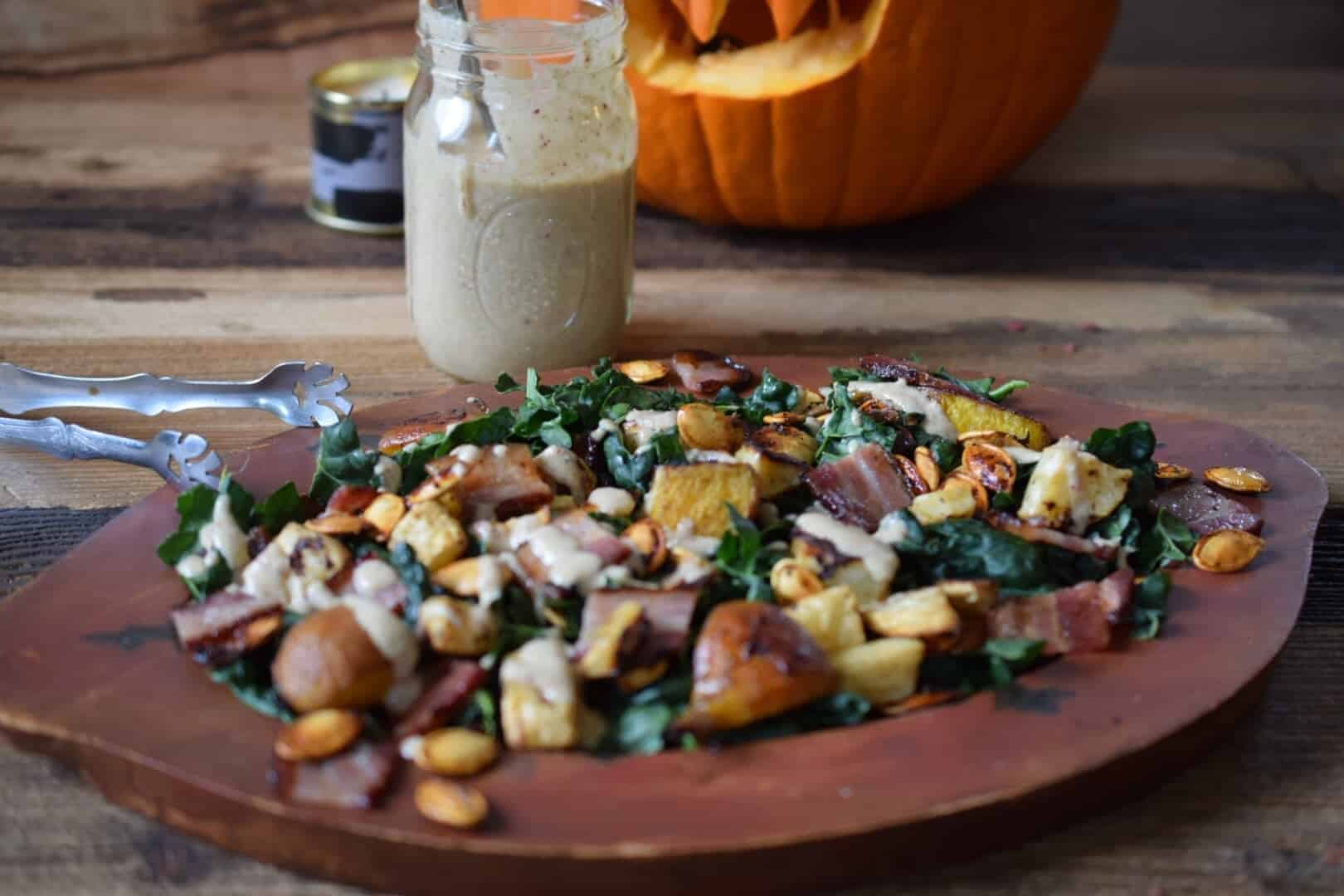 This fall salad is a celebration of seasonal produce and flavors. Roasted beets and toasty bacon, pumpkin seeds and a warm apple pecan dressing! 