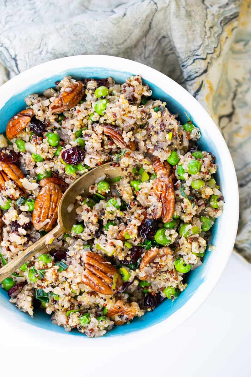pilaf of quinoa and cauliflower with pecans, peas and cranberries