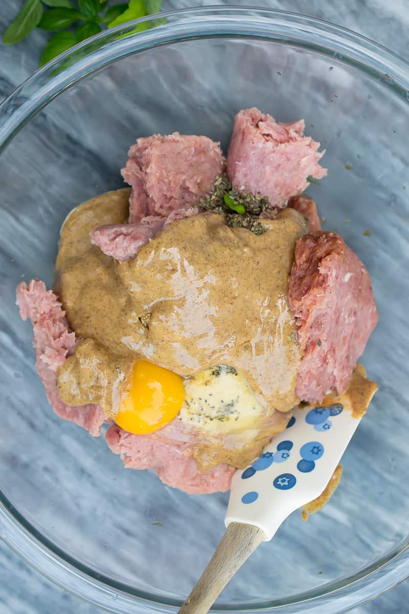 step by step turkey burgers
-image of first step mixing all ingredients for patty in a bowl