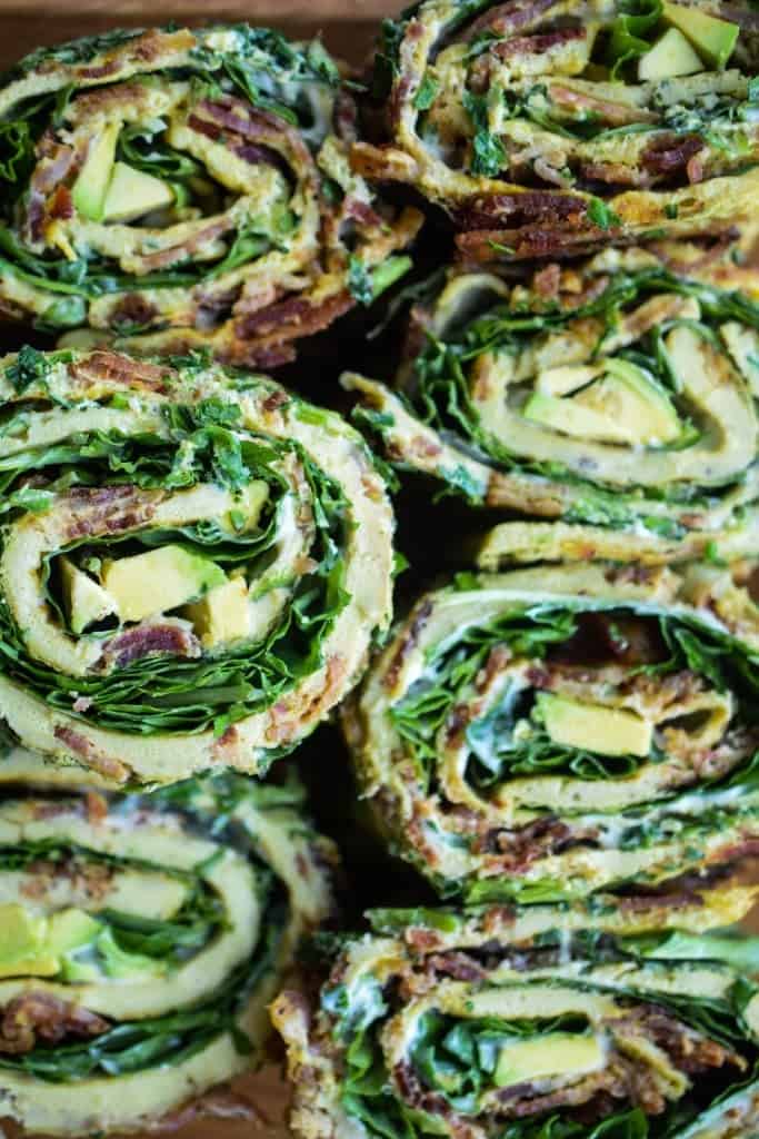egg roll-ups with bacon, greens, and avocado