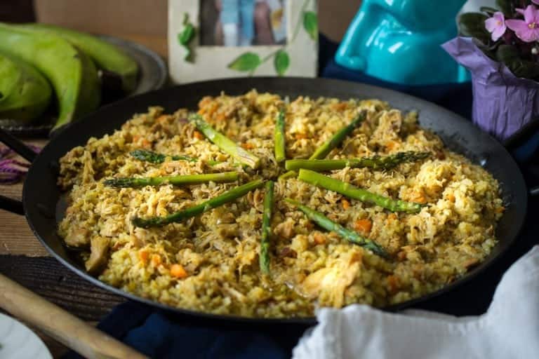 rice with chicken and asparagus in a skillet