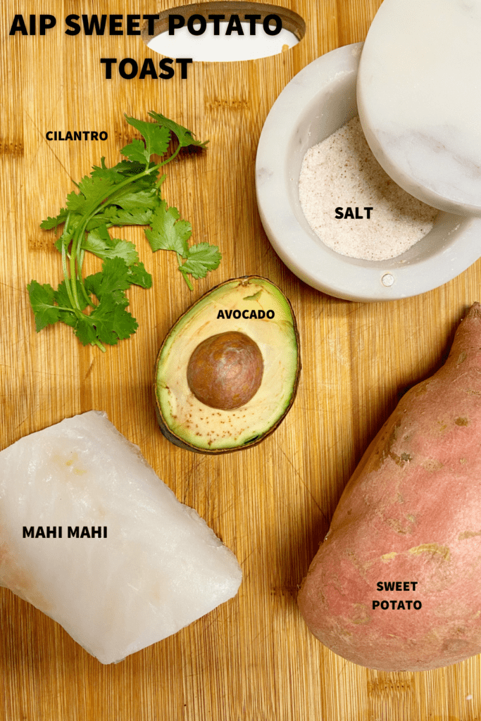 white fish, sweet potato, salt, avocado and cilantro on a cutting board