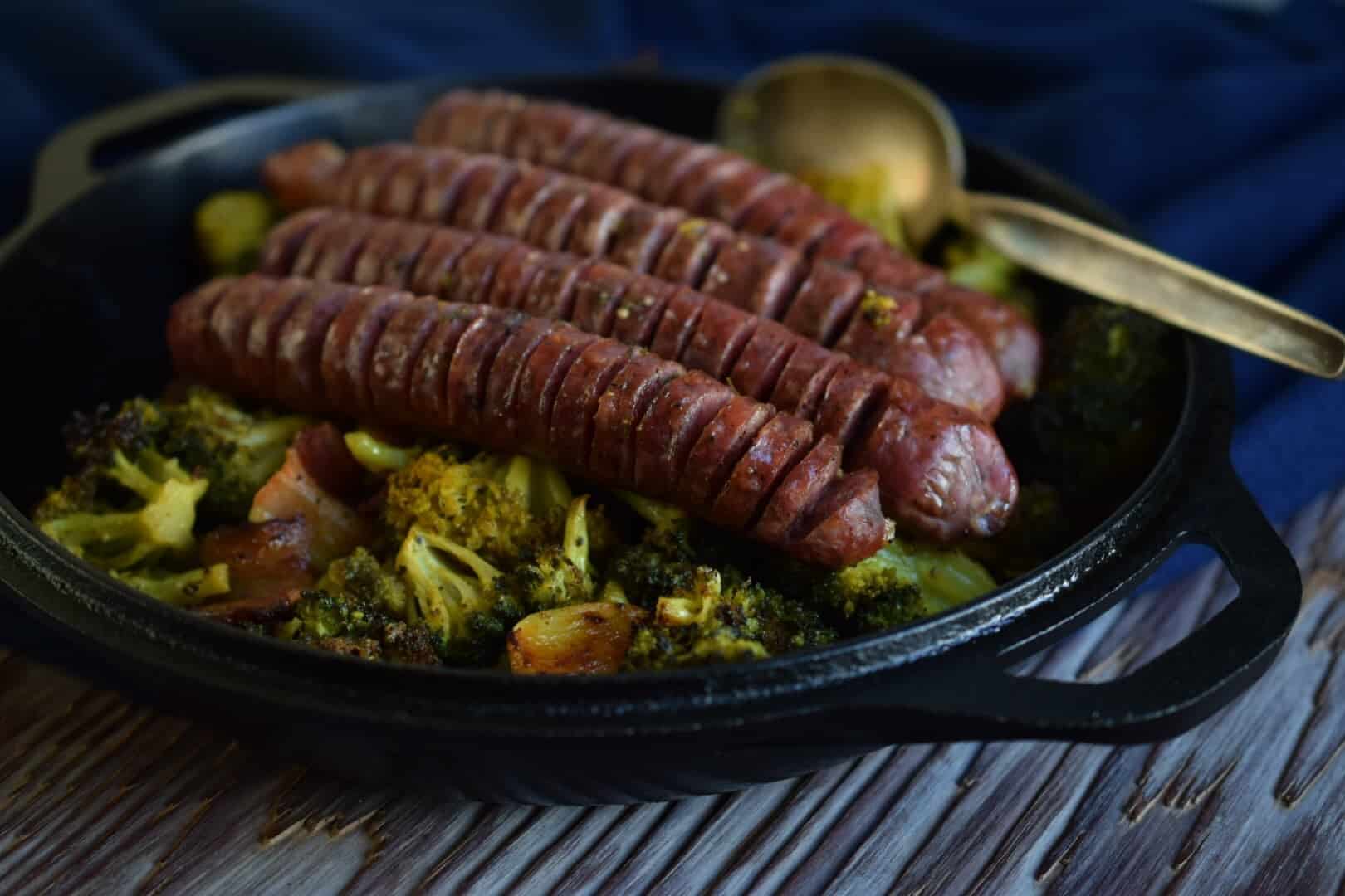 Roasted brussel sprouts with roasted brussel sprouts and bacon in a cast iron pot 