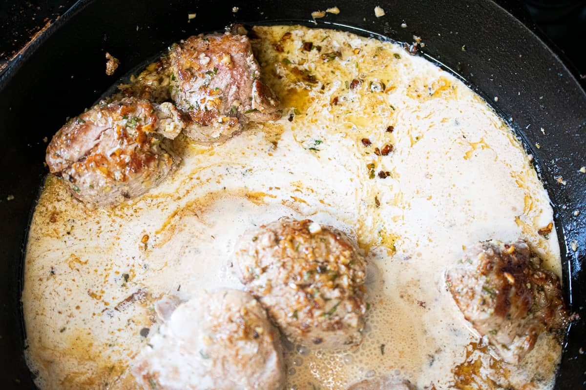 Ginger Rosemary Braised Pork Loin Medallions Over Roasted Spaghetti Squash | The Castaway Kitchen