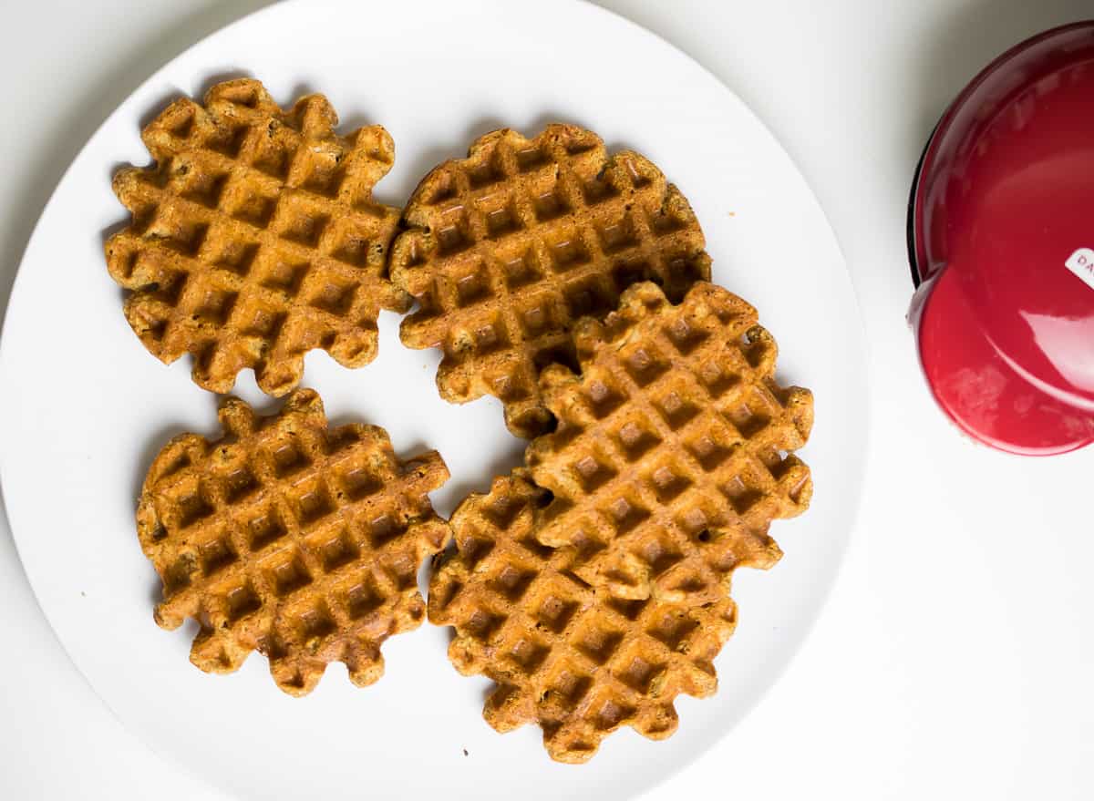 five crispy aip waffles on a plate