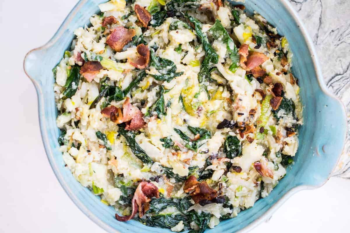 cauliflower colcannon in a blue platter