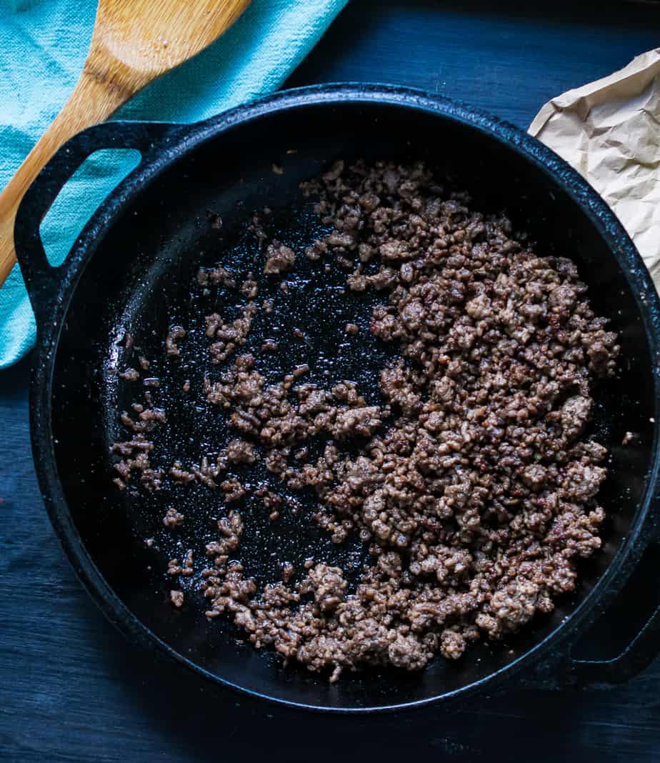 crispy ground beef in a cast iron skillet 