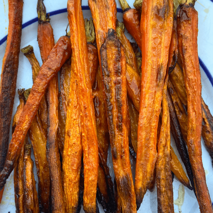 crispy roasted carrots on a plate