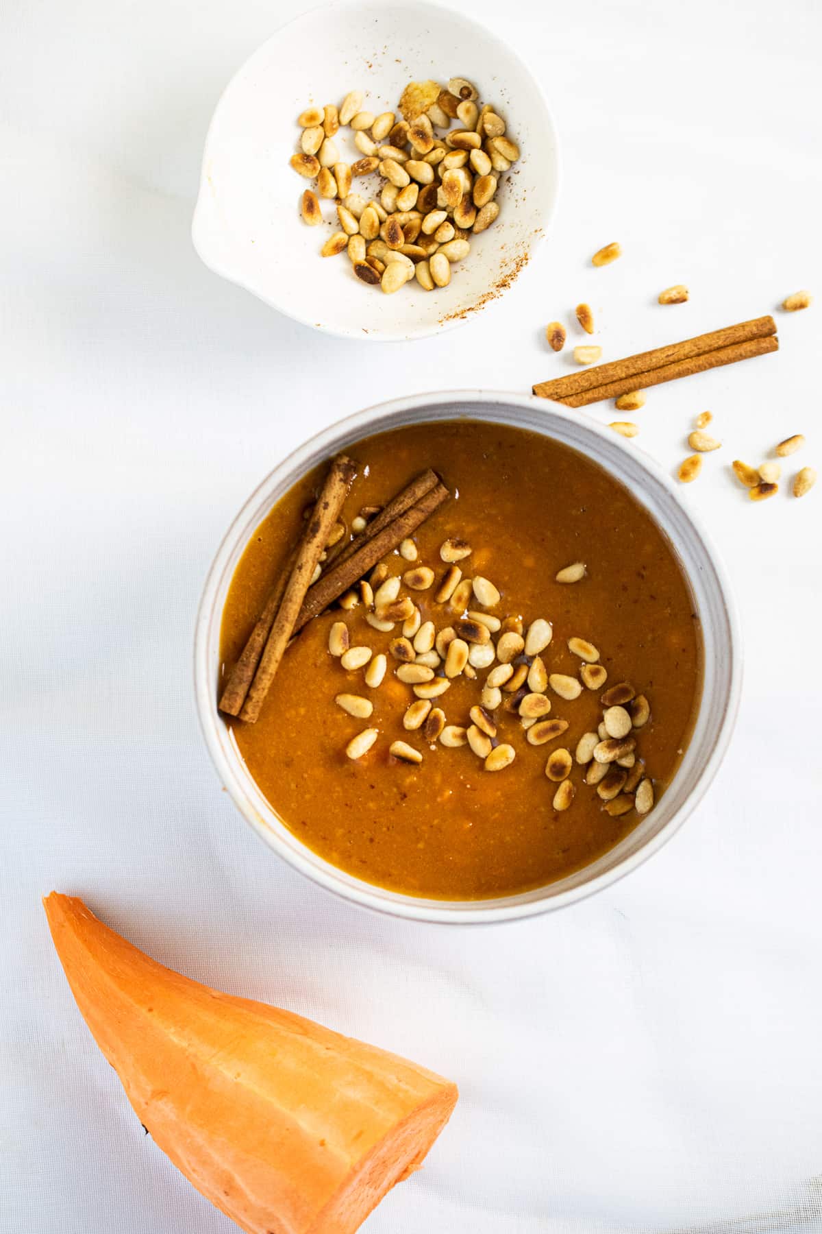 paleo sweet potato porridge with cinnamon and toasted pine nuts 