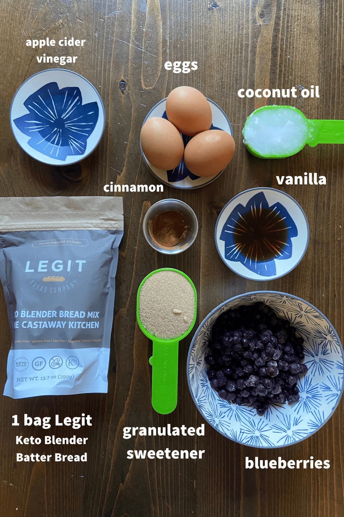 a brown table with measured ingredients for blender blueberry bread
