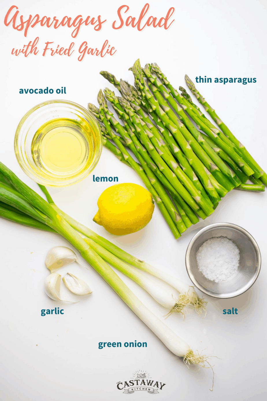 AIP asparagus salad ingredients laid out on table; garlic, green onion, salt, lemon, asparagus, avocado oil 