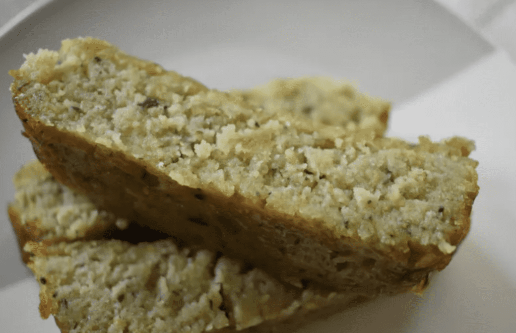 slices of aip zucchini bread stacked on a plate