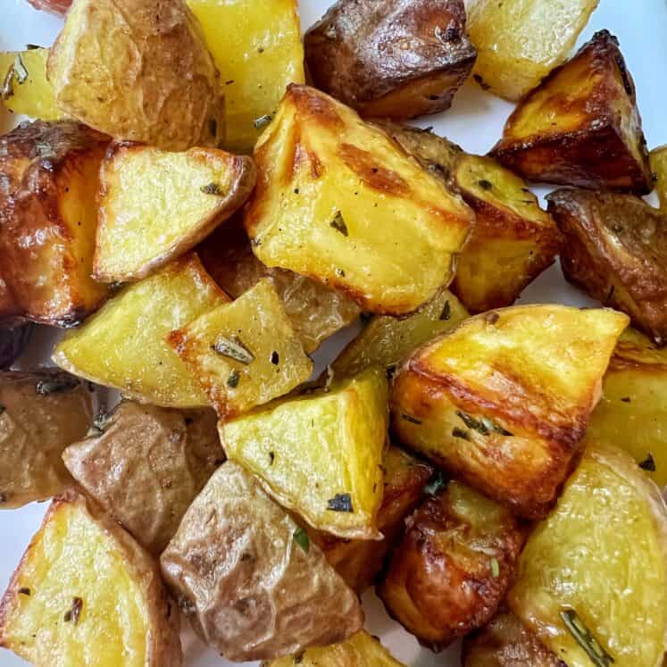 close up of diced golden brown potatoes made in the air fryer