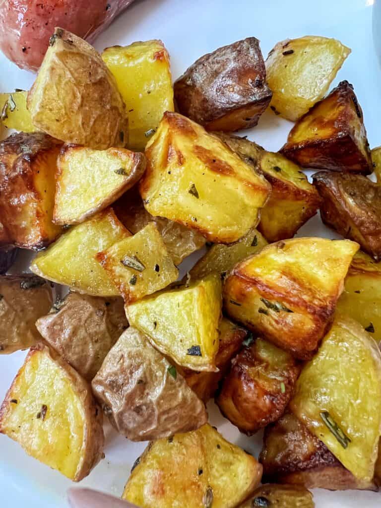 close up of diced golden brown potatoes made in the air fryer