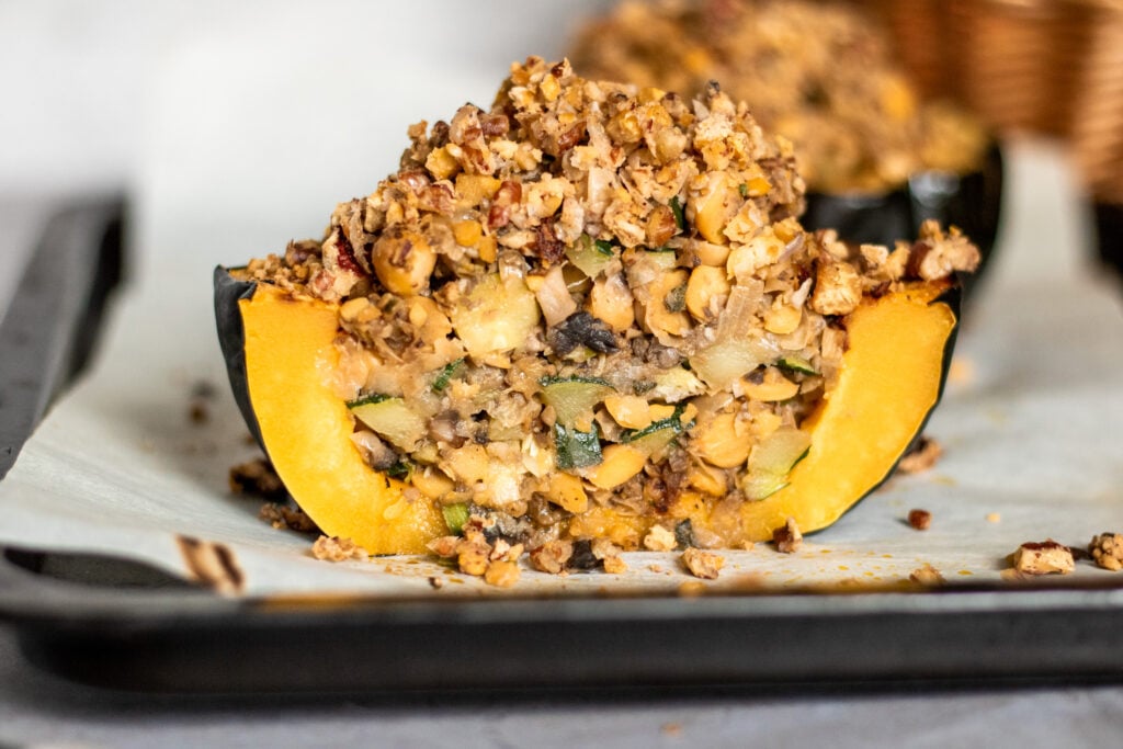 Gluten-free Zucchini and Mushroom Stuffed Squash with Pecan and Chickpea Crumble