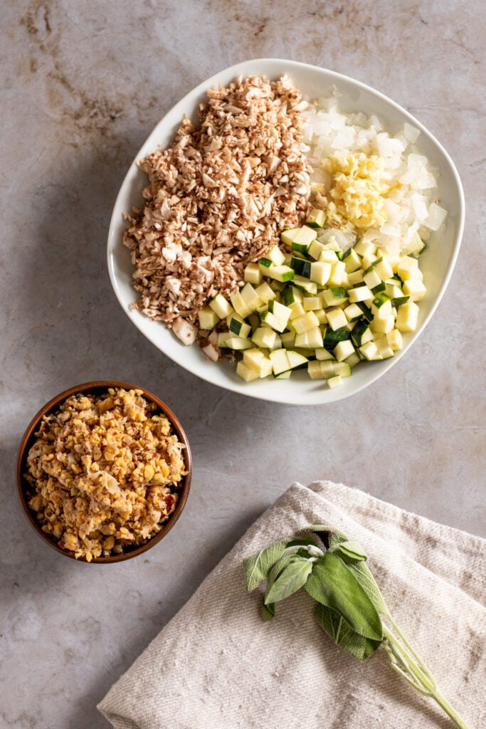 Gluten-free Zucchini and Mushroom Stuffed Squash with Pecan and Chickpea Crumble